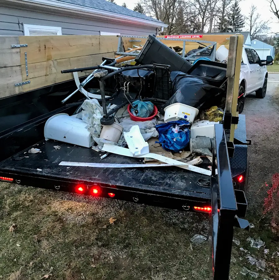 Roll-off dumpster delivered to a residential driveway in Cameron