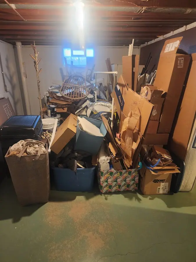 Roll-off dumpster container at job site for Yard Waste Dumpster Rental in Cameron